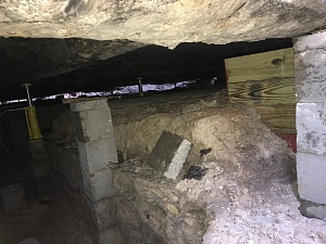 Image showing the structure underneath the foundation during a House Lifting project.