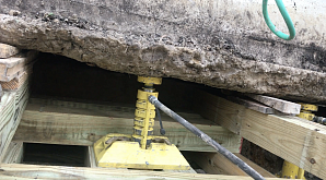 House Lifting Project Image of home being lifted by Atlas Foundation Repair