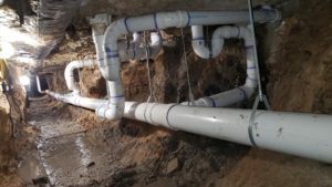 pipe replacement under slab of building